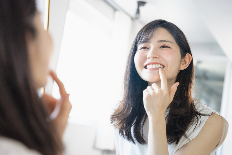 口元へのコンプレックスを改善し、笑顔に自信を
